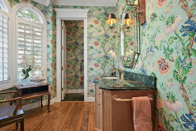 2051 E Normandywoods Ct, Holladay, UT 84117 - bathroom with wallpapered walls, wood finished floors, vanity, and baseboards