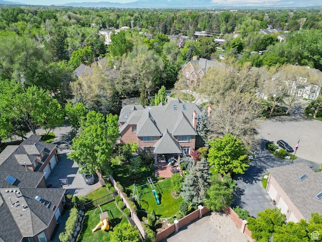 2051 E Normandywoods Ct, Holladay, UT 84117 - aerial view of property and surrounding area featuring a forest and nearby suburban area