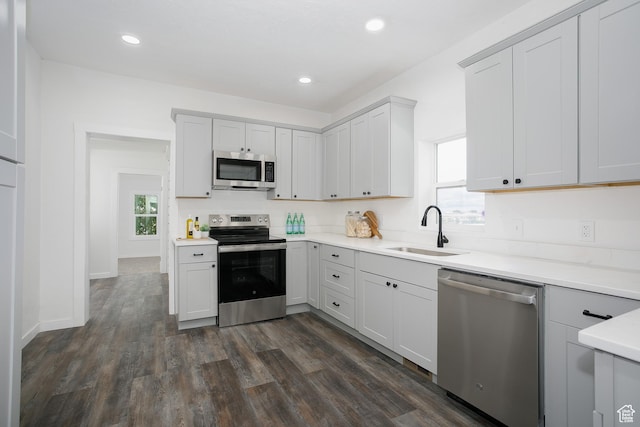 2213 Ogden Ave, Ogden, UT 84401 - kitchen featuring stainless steel appliances, a sink, plenty of natural light, dark wood-style flooring, and recessed lighting