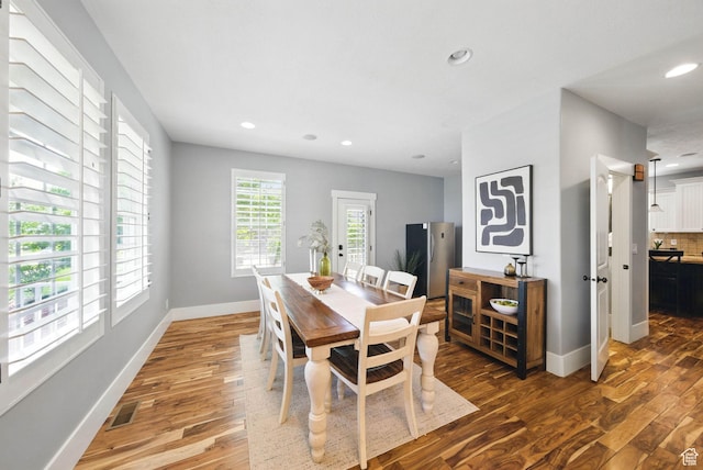 10416 S Vermillion Dr W, South Jordan, UT 84009 - dining area featuring wood finished floors, recessed lighting, and baseboards