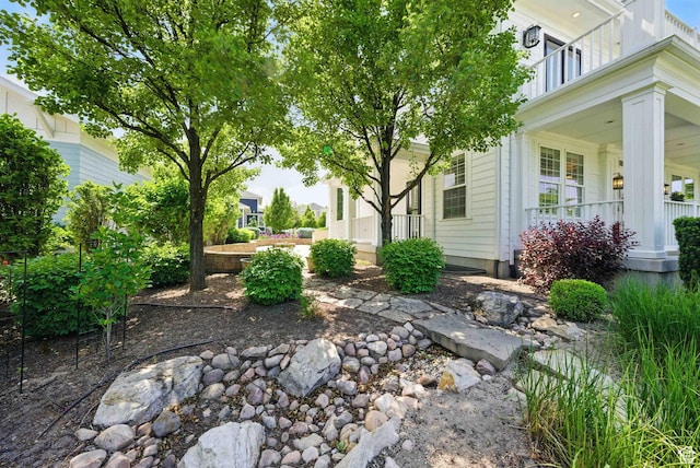 10416 S Vermillion Dr W, South Jordan, UT 84009 - view of yard featuring covered porch and a balcony