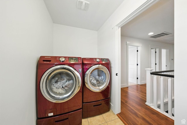 10416 S Vermillion Dr W, South Jordan, UT 84009 - laundry room with washer and clothes dryer, baseboards, tile patterned floors, and recessed lighting