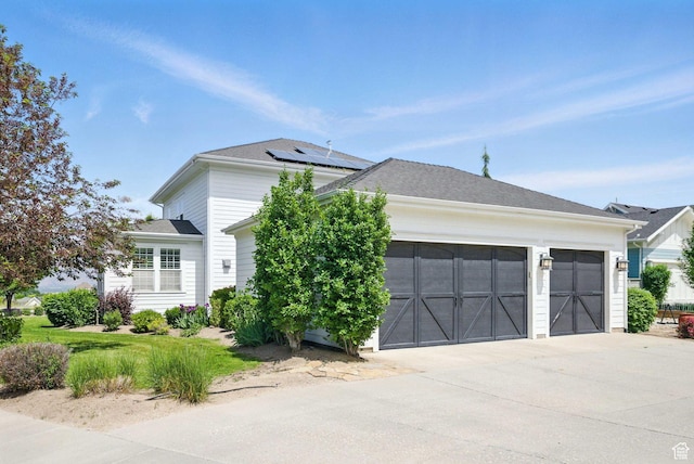 10416 S Vermillion Dr W, South Jordan, UT 84009 - view of front of home with an attached garage and concrete driveway