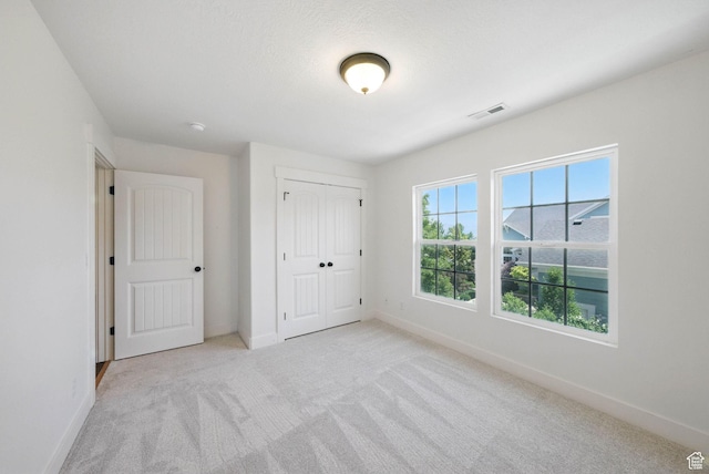 10416 S Vermillion Dr W, South Jordan, UT 84009 - unfurnished bedroom featuring carpet, baseboards, and a closet