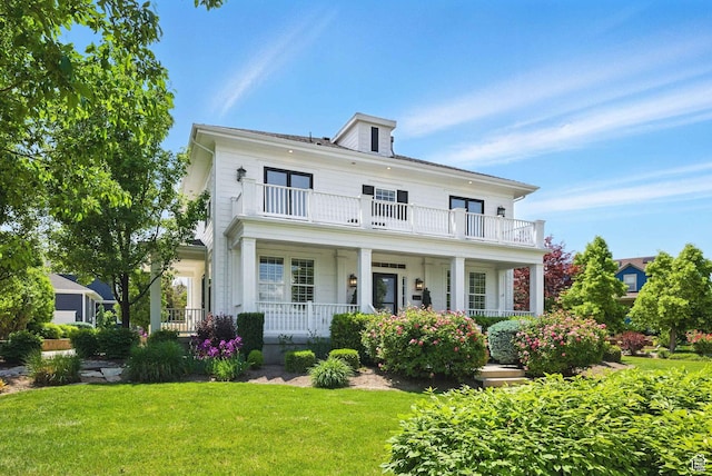 10416 S Vermillion Dr W, South Jordan, UT 84009 - view of front facade featuring a balcony, a porch, and a front yard