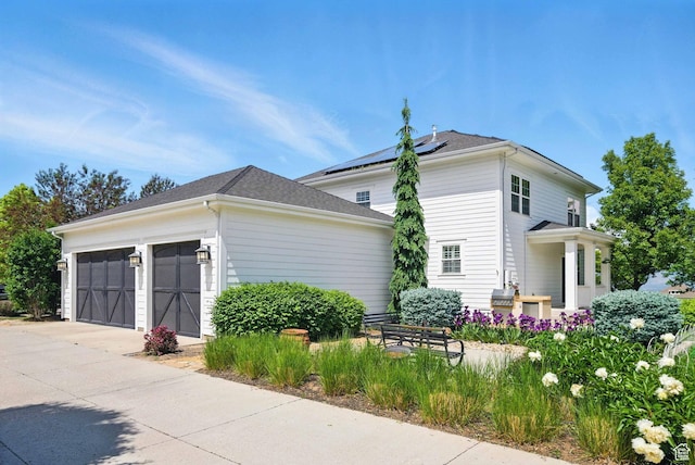10416 S Vermillion Dr W, South Jordan, UT 84009 - view of property exterior with concrete driveway and a garage