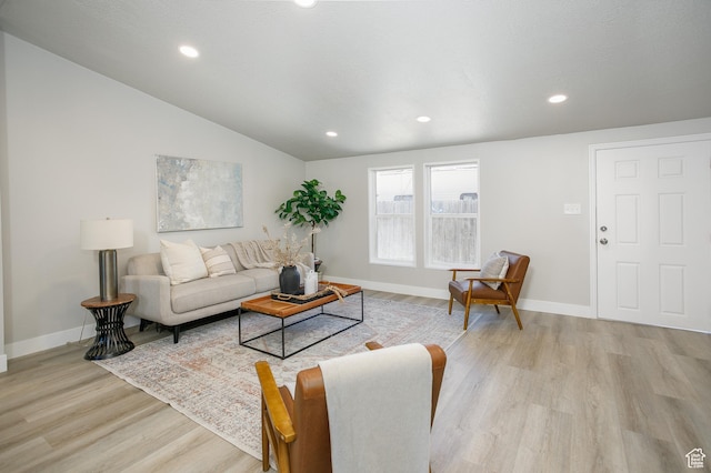 1623 W Claybourne Ave S, West Valley City, UT 84119 - living room with light wood-type flooring, baseboards, recessed lighting, and vaulted ceiling