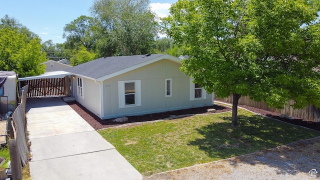 1623 W Claybourne Ave S, West Valley City, UT 84119 - view of home's exterior featuring driveway and a carport