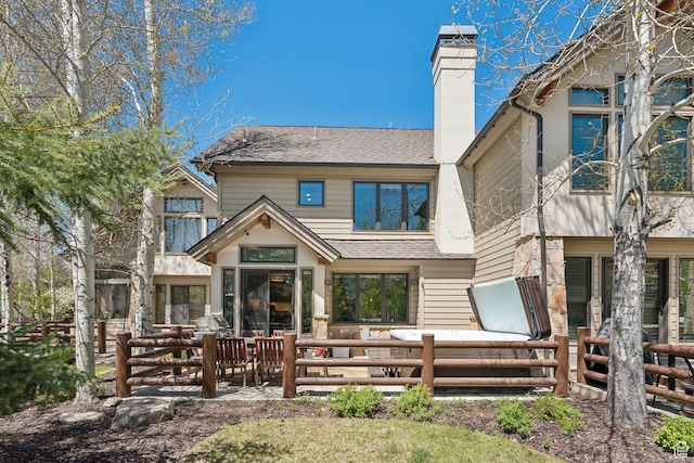 2464 Deer Lake Dr, Park City, UT 84060 - rear view of property featuring a chimney, a shingled roof, and a patio