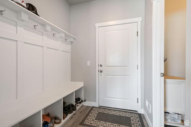 2076 E Granite Ln N Unit 145, Eagle Mountain, UT 84005 - mudroom featuring baseboards and dark wood-style floors