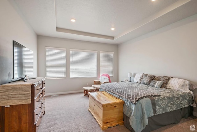 2076 E Granite Ln N Unit 145, Eagle Mountain, UT 84005 - bedroom featuring light carpet, baseboards, recessed lighting, and a tray ceiling