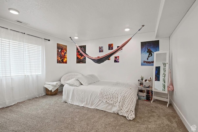 2076 E Granite Ln N Unit 145, Eagle Mountain, UT 84005 - carpeted bedroom featuring recessed lighting, a textured ceiling, and baseboards