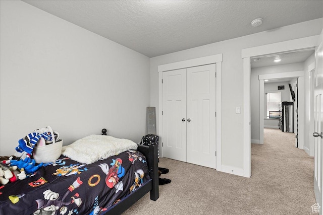 464 S Trejo Ridge Rd, Grantsville, UT 84029 - bedroom featuring light colored carpet, baseboards, a closet, and a textured ceiling