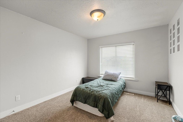 464 S Trejo Ridge Rd, Grantsville, UT 84029 - carpeted bedroom with a textured ceiling and baseboards
