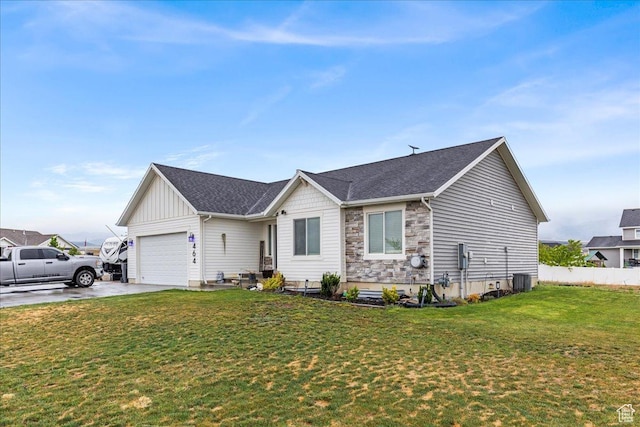 464 S Trejo Ridge Rd, Grantsville, UT 84029 - single story home featuring an attached garage, driveway, stone siding, and roof with shingles