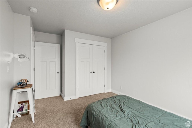 464 S Trejo Ridge Rd, Grantsville, UT 84029 - carpeted bedroom featuring a textured ceiling, a closet, and baseboards