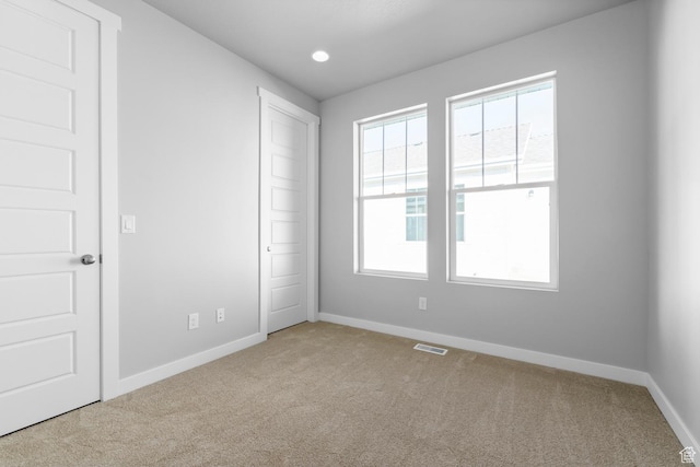 9806 N Willowbank Dr, Highland, UT 84003 - unfurnished bedroom with carpet flooring, baseboards, and a closet