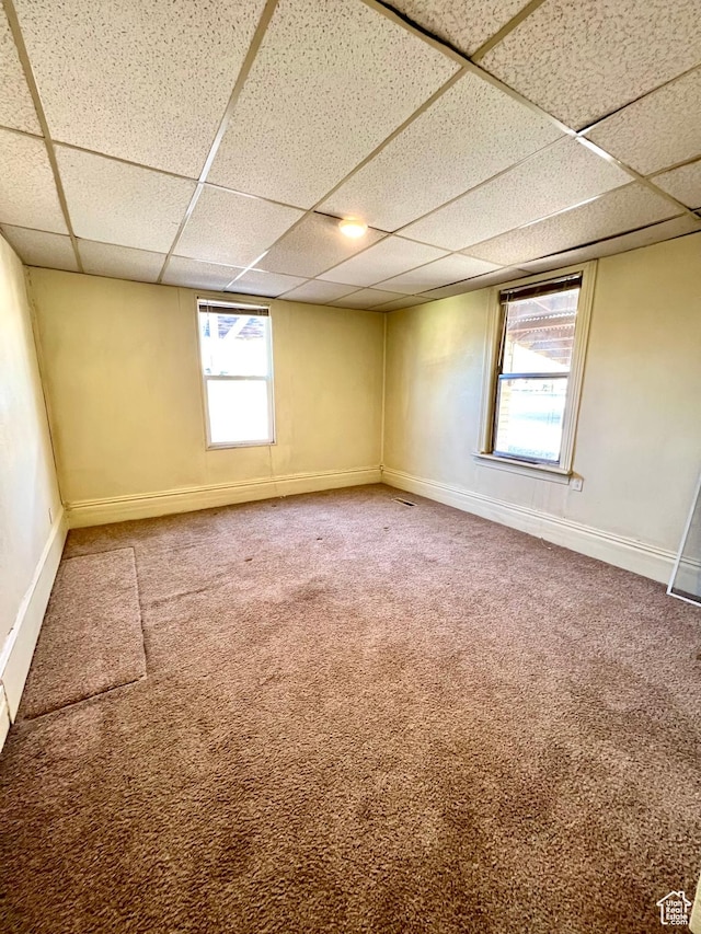 509 E 300 N, Richfield, UT 84701 - empty room with a paneled ceiling, carpet, and baseboards
