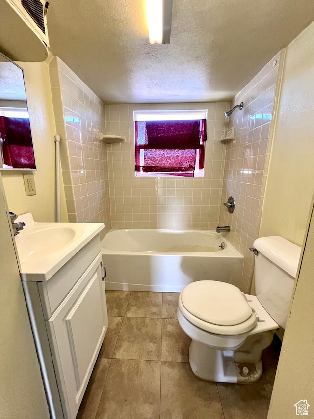 509 E 300 N, Richfield, UT 84701 - full bathroom with toilet, vanity, a textured ceiling, bathtub / shower combination, and tile patterned flooring