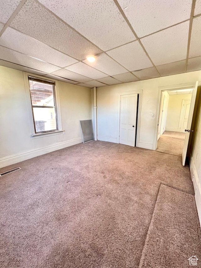 509 E 300 N, Richfield, UT 84701 - unfurnished bedroom featuring a paneled ceiling, carpet flooring, and baseboards