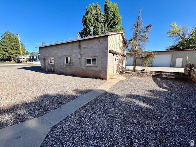 509 E 300 N, Richfield, UT 84701 - view of side of property featuring concrete block siding and an outdoor structure