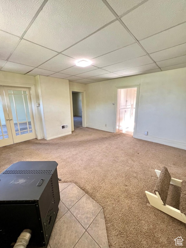 509 E 300 N, Richfield, UT 84701 - spare room with a paneled ceiling, carpet flooring, and baseboards