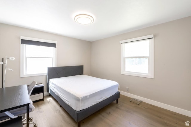 561 N 700 E, Provo, UT 84606 - bedroom with light wood-style flooring, baseboards, and an office area