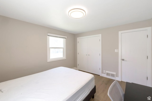 561 N 700 E, Provo, UT 84606 - bedroom featuring light wood-style flooring and a closet