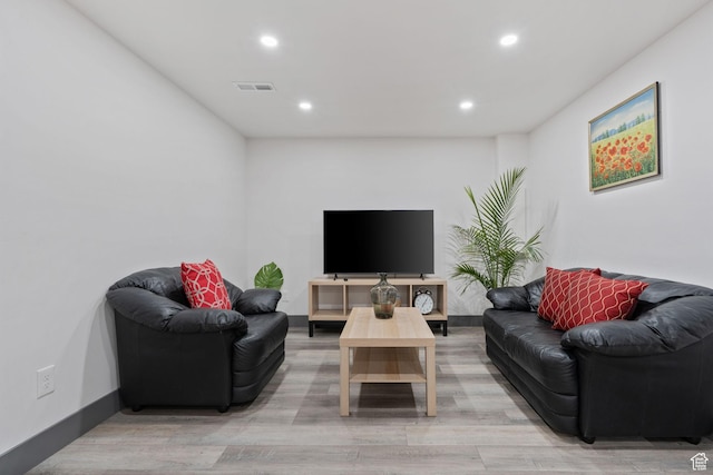 3649 S Hawkeye St, West Valley City, UT 84120 - living room featuring recessed lighting, light wood-style floors, and baseboards