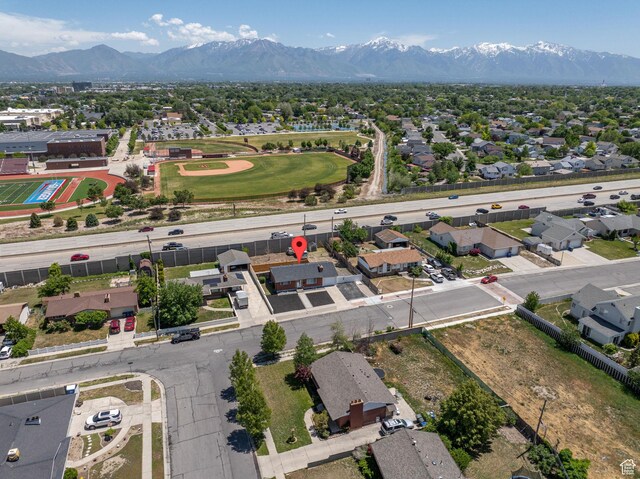 3649 S Hawkeye St, West Valley City, UT 84120 - aerial perspective of suburban area featuring a mountain backdrop