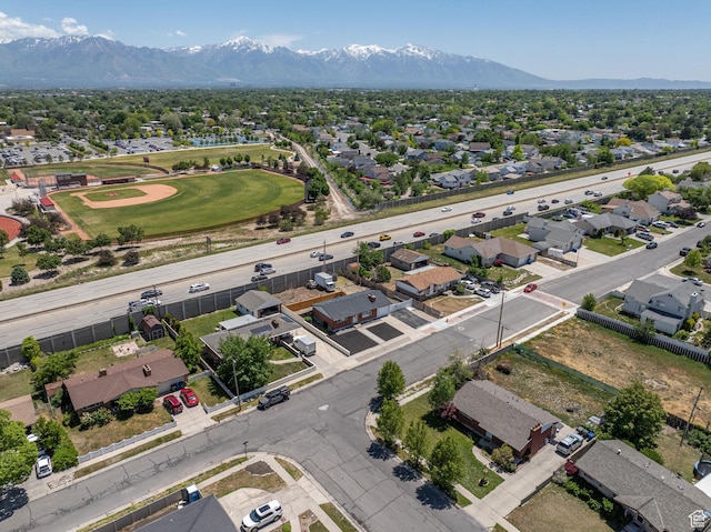 3649 S Hawkeye St, West Valley City, UT 84120 - aerial perspective of suburban area with mountains