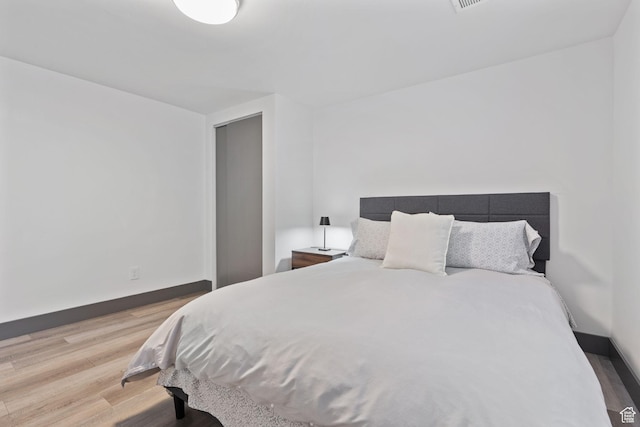 3649 S Hawkeye St, West Valley City, UT 84120 - bedroom featuring wood finished floors and baseboards