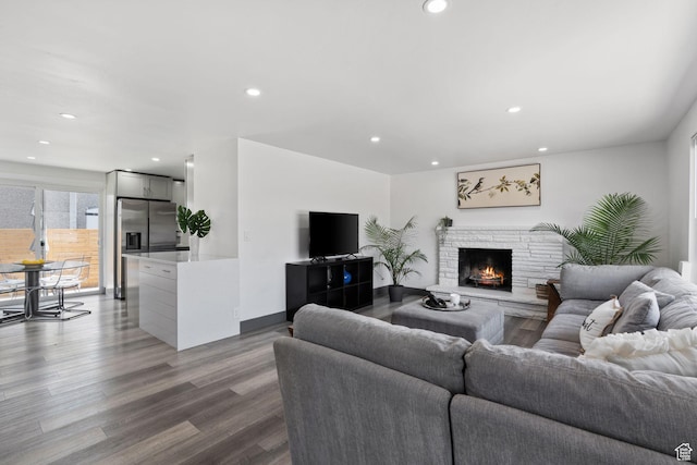 3649 S Hawkeye St, West Valley City, UT 84120 - living area featuring recessed lighting, wood finished floors, and a lit fireplace