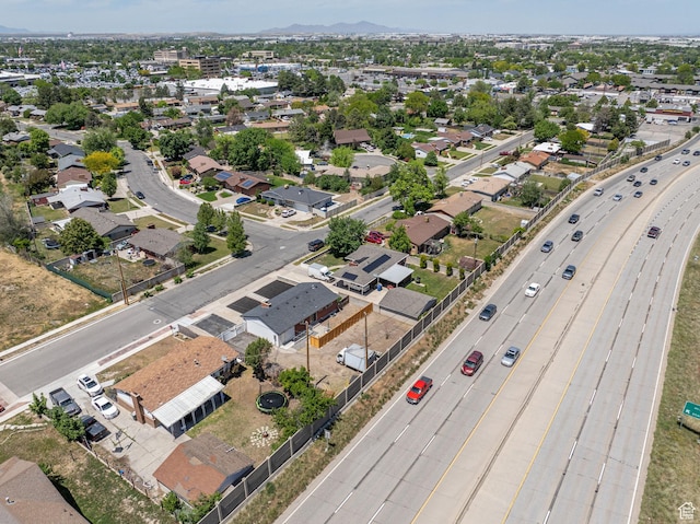 3649 S Hawkeye St, West Valley City, UT 84120 - aerial perspective of suburban area with mountains and a major roadway