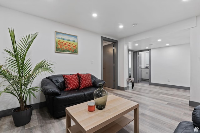 3649 S Hawkeye St, West Valley City, UT 84120 - living area with light wood-type flooring, recessed lighting, and baseboards