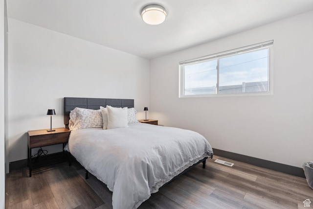 3649 S Hawkeye St, West Valley City, UT 84120 - bedroom with wood finished floors and baseboards