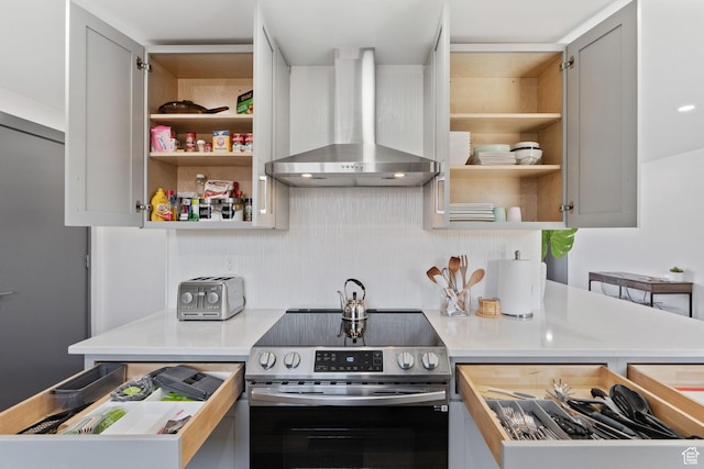 3649 S Hawkeye St, West Valley City, UT 84120 - kitchen featuring stainless steel electric stove, wall chimney range hood, open shelves, and light countertops