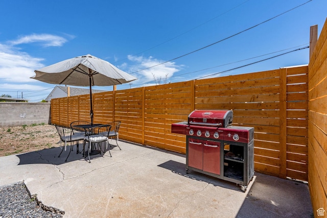 3649 S Hawkeye St, West Valley City, UT 84120 - fenced backyard with outdoor dining space, a patio, and area for grilling