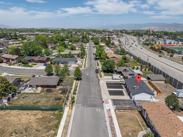 3649 S Hawkeye St, West Valley City, UT 84120 - aerial perspective of suburban area featuring a mountain backdrop