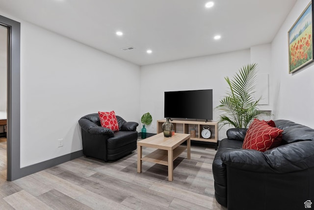 3649 S Hawkeye St, West Valley City, UT 84120 - living room featuring light wood-style floors, recessed lighting, and baseboards