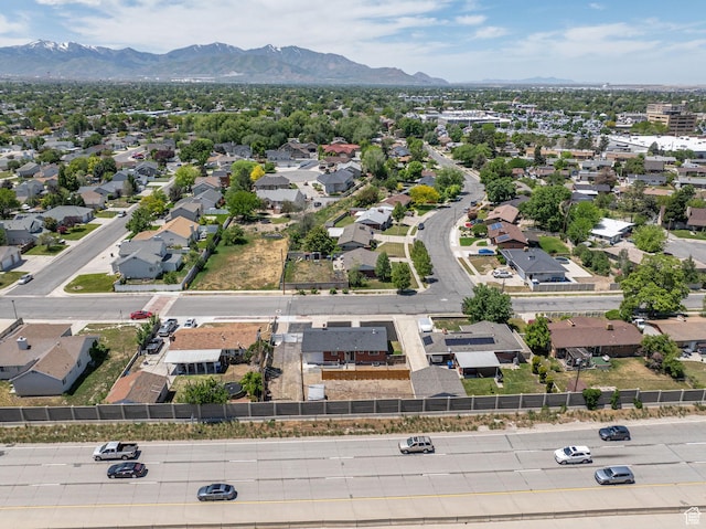 3649 S Hawkeye St, West Valley City, UT 84120 - aerial view of residential area with a mountainous background