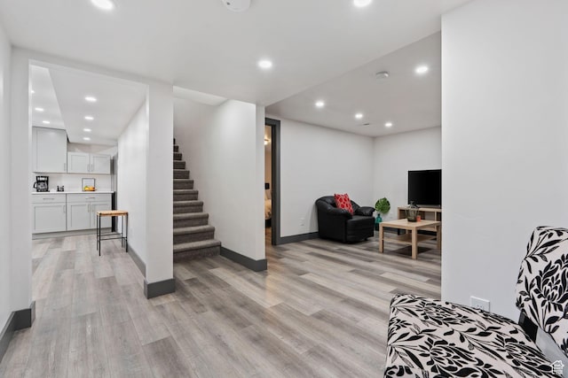 3649 S Hawkeye St, West Valley City, UT 84120 - living room featuring light wood-style flooring, stairs, recessed lighting, and baseboards