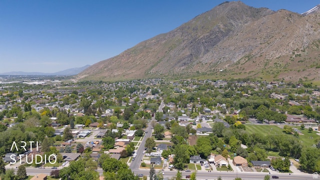 697 E Center St, Springville, UT 84663 - aerial view of property and surrounding area with mountains and nearby suburban area