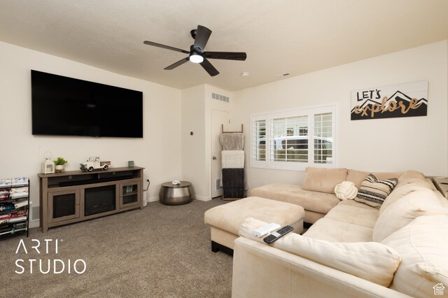 697 E Center St, Springville, UT 84663 - living room featuring a ceiling fan, carpet floors, and baseboards