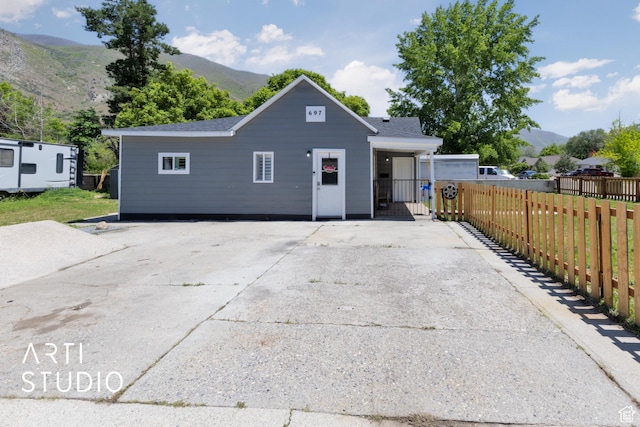 697 E Center St, Springville, UT 84663 - view of front of house with a mountain view and concrete driveway