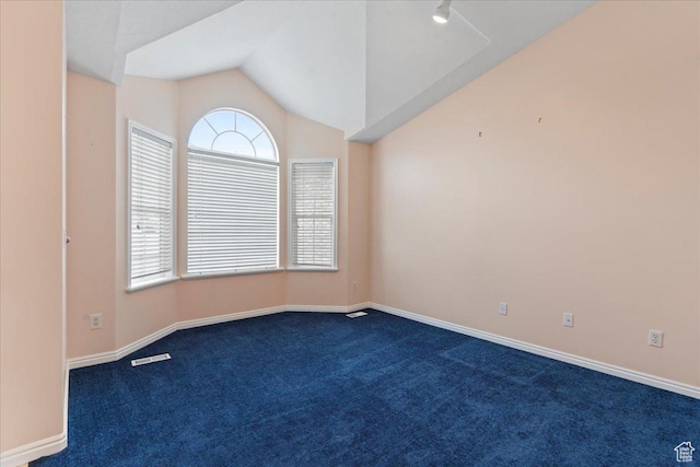 2718 W Southpointe Rd, South Jordan, UT 84095 - unfurnished room featuring healthy amount of natural light, dark carpet, lofted ceiling, and baseboards