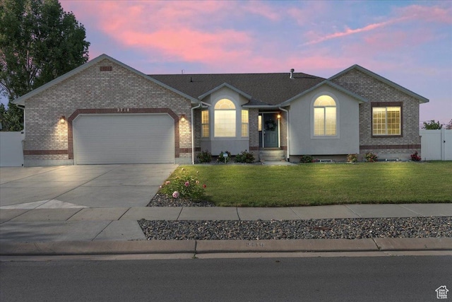 2718 W Southpointe Rd, South Jordan, UT 84095 - ranch-style house with an attached garage, driveway, and brick siding