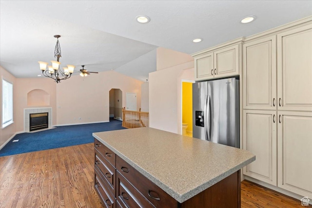 2718 W Southpointe Rd, South Jordan, UT 84095 - kitchen featuring cream cabinets, stainless steel fridge with ice dispenser, light countertops, a chandelier, and dark brown cabinetry