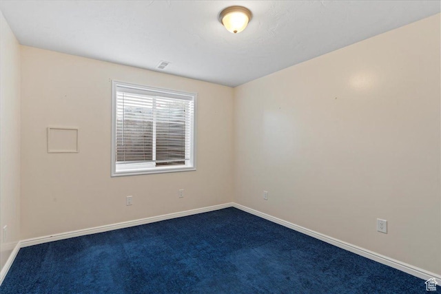 2718 W Southpointe Rd, South Jordan, UT 84095 - empty room featuring dark colored carpet and baseboards