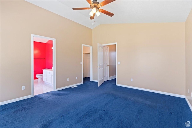 2718 W Southpointe Rd, South Jordan, UT 84095 - unfurnished bedroom featuring carpet, baseboards, lofted ceiling, a walk in closet, and ensuite bath
